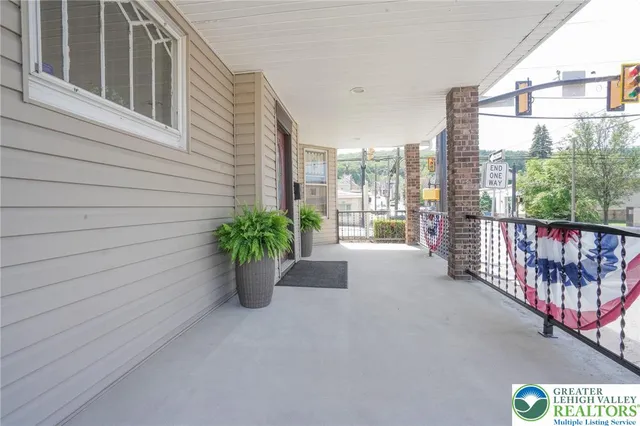a view of a balcony with window