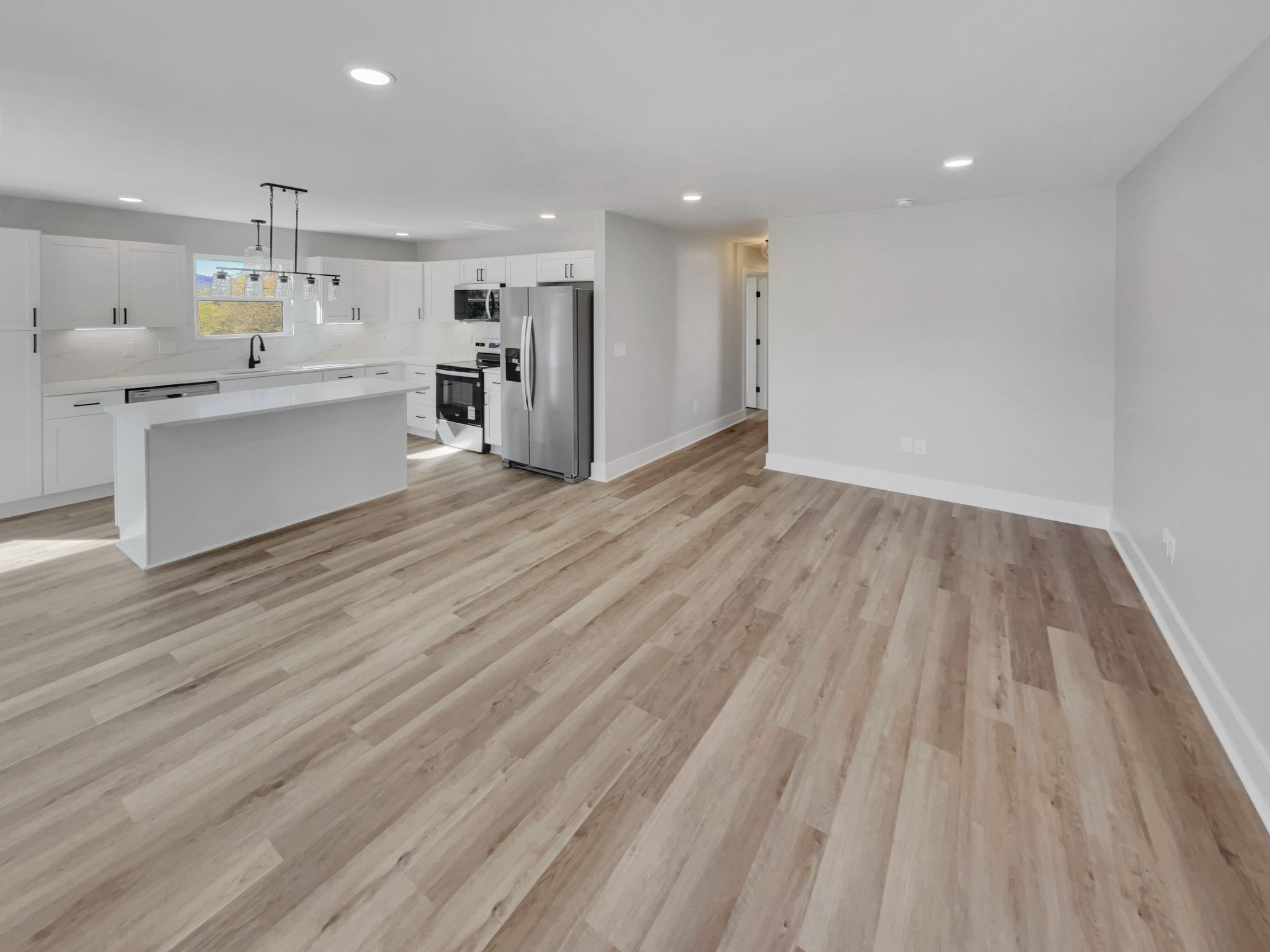 200 New Town Road Watertown, TN 37184 - Photo 3 of 13 a view of kitchen with wooden floor and electronic appliances