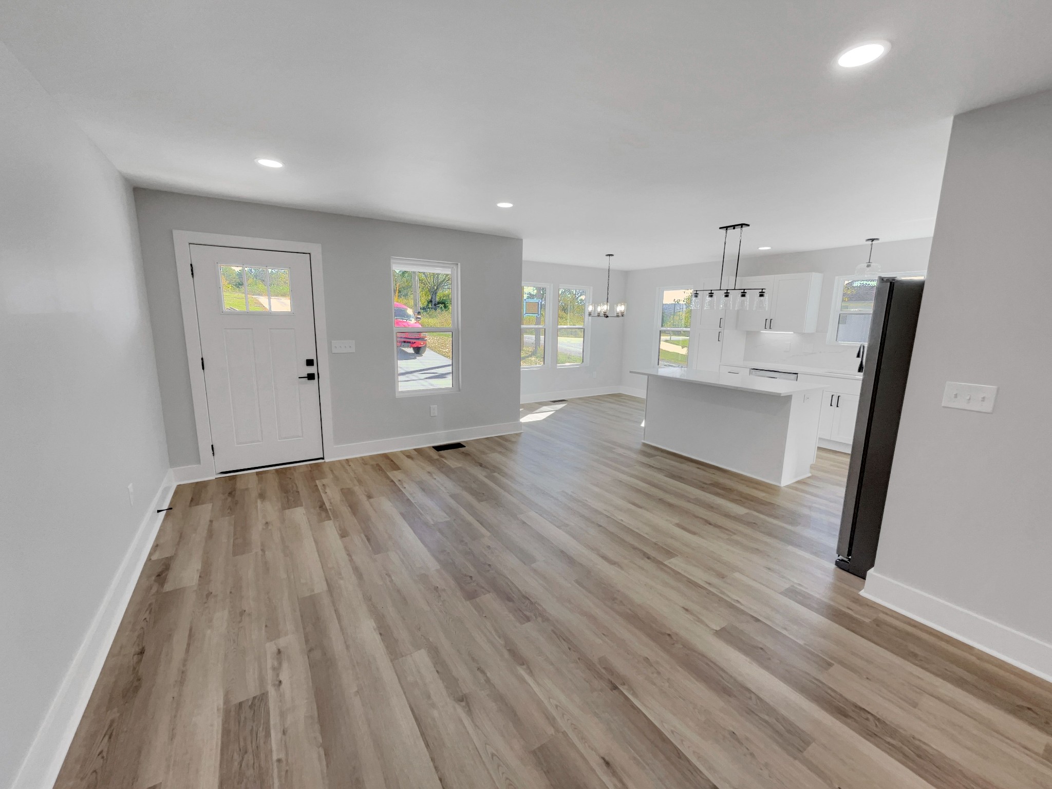 200 New Town Road Watertown, TN 37184 - Photo 4 of 13 wooden floor in an empty room with a window