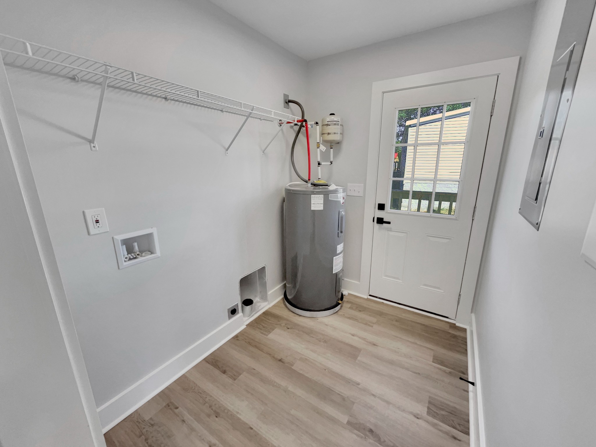 200 New Town Road Watertown, TN 37184 - Photo 10 of 13 a view of a storage & utility room with a window
