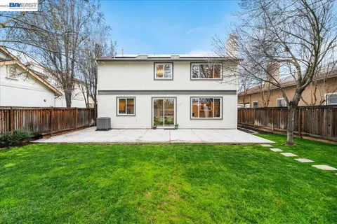 a front view of a house with yard