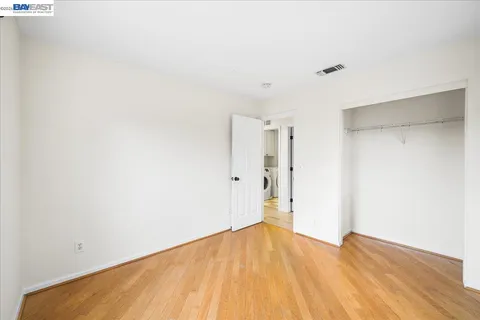 an aerial view of multiple houses with yard