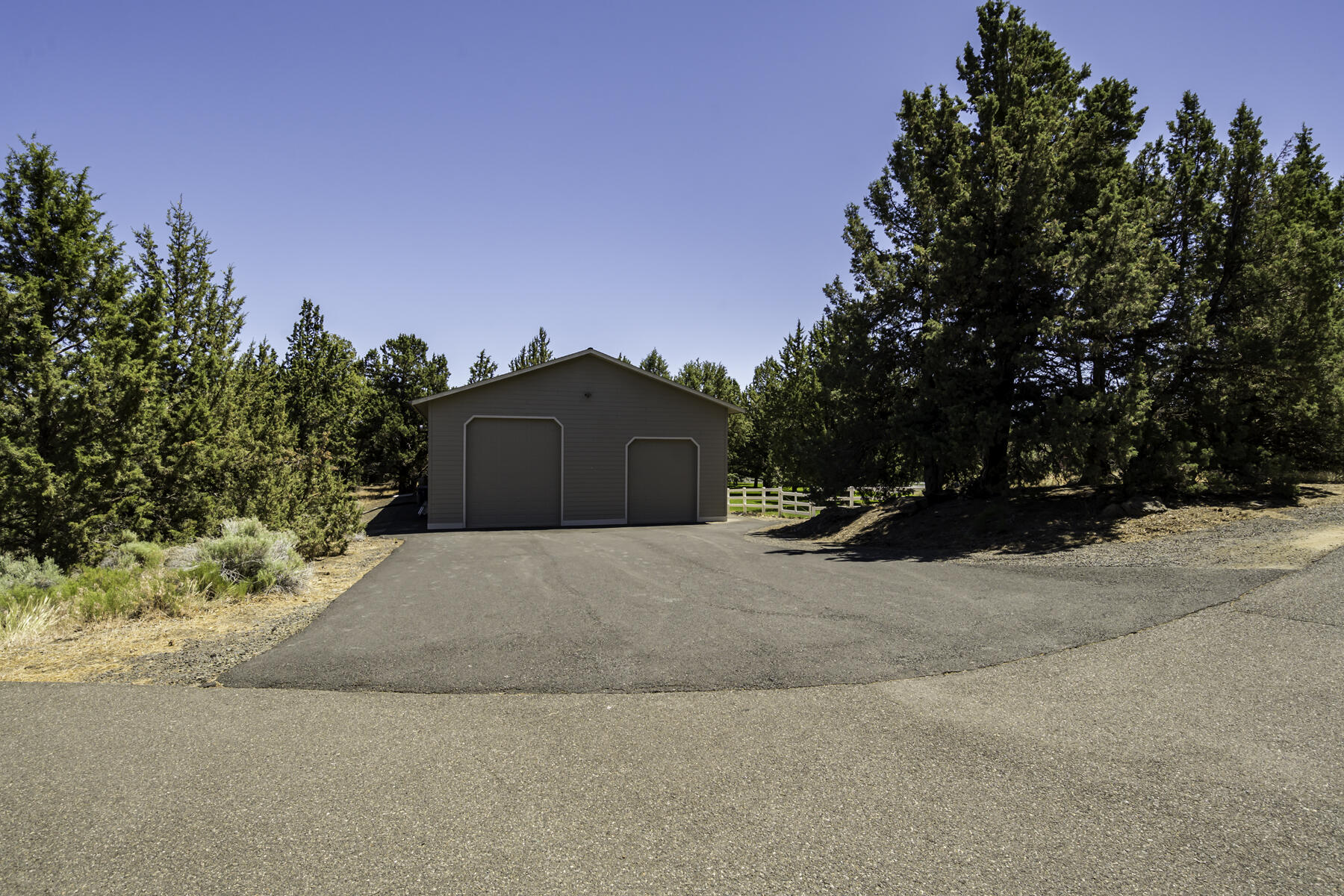 61445 Gosney Road Bend, OR 97702 - Photo 18 of 83 a house with trees in the background