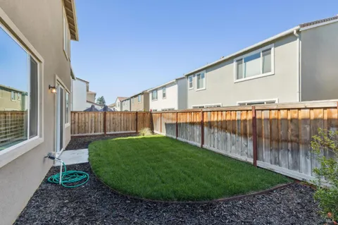 a view of a backyard with plants