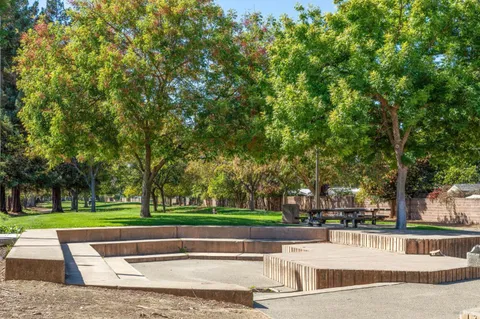 a view of backyard with green space