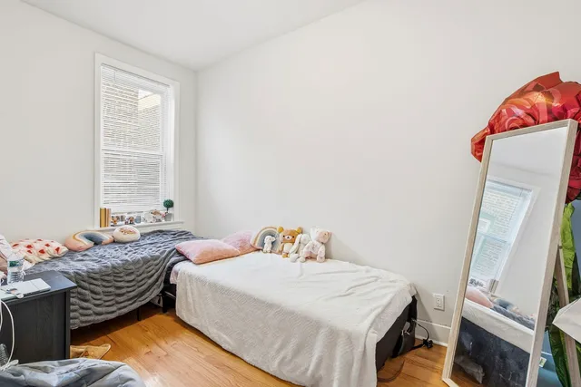 a bathroom with a tub and shower