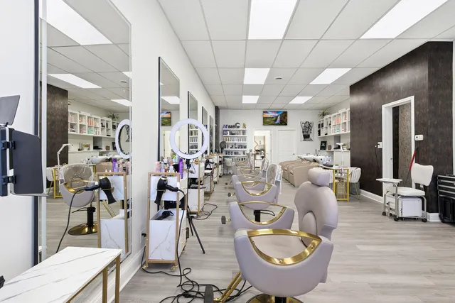 a living room with furniture a rug and a fireplace