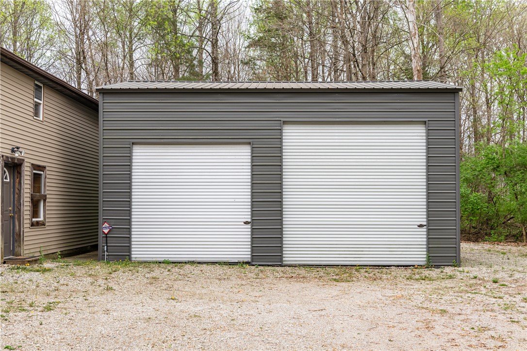 6750 Little Twin Road Germantown, OH 45327 - Photo 48 of 88 This practical two-door garage offers ample storage and easy access for vehicles or equipment.