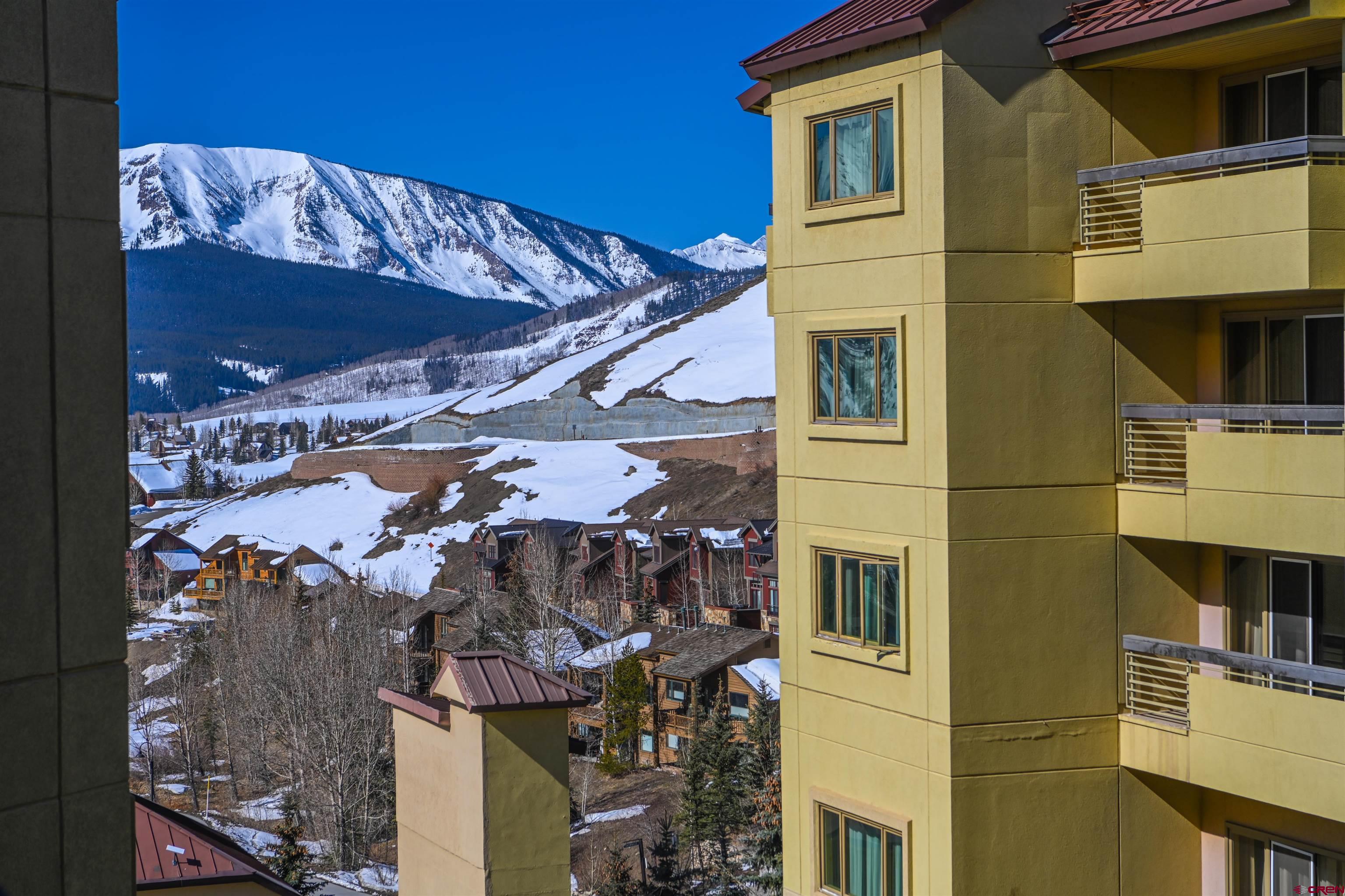 500 Gothic Road, Unit 437 Crested Butte, CO 81225 - Photo 16 of 18 a view of a house with a door