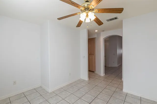 a bathroom with a sink a toilet a mirror and shower