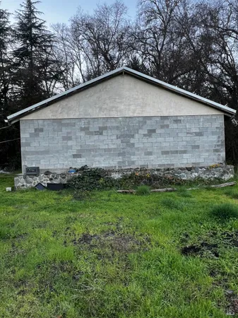 a backyard of a house with lots of green space