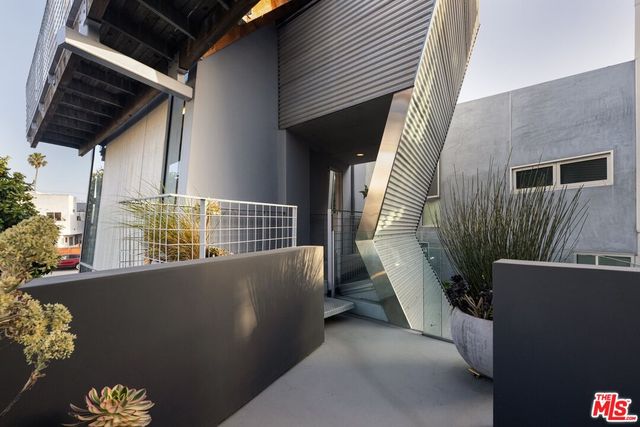 a room with furniture and a flat screen tv