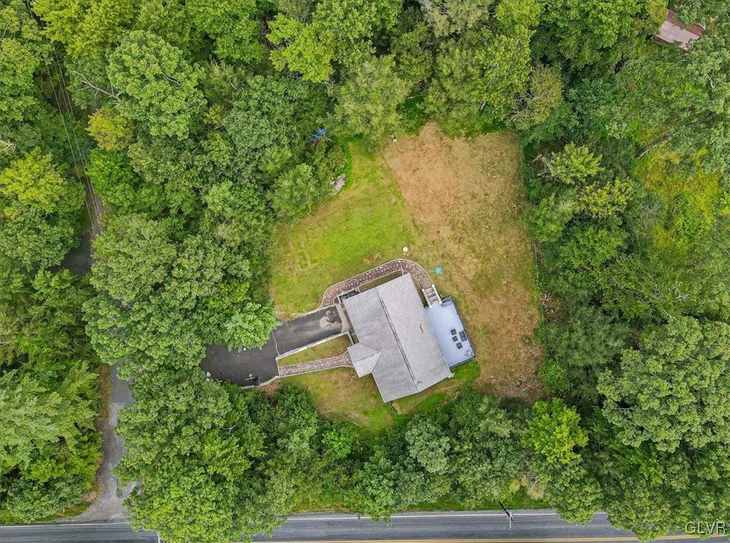 400 Carlton Road Mount Pocono, PA 18344 - Photo 46 of 50 an aerial view of a house with a yard and lake view