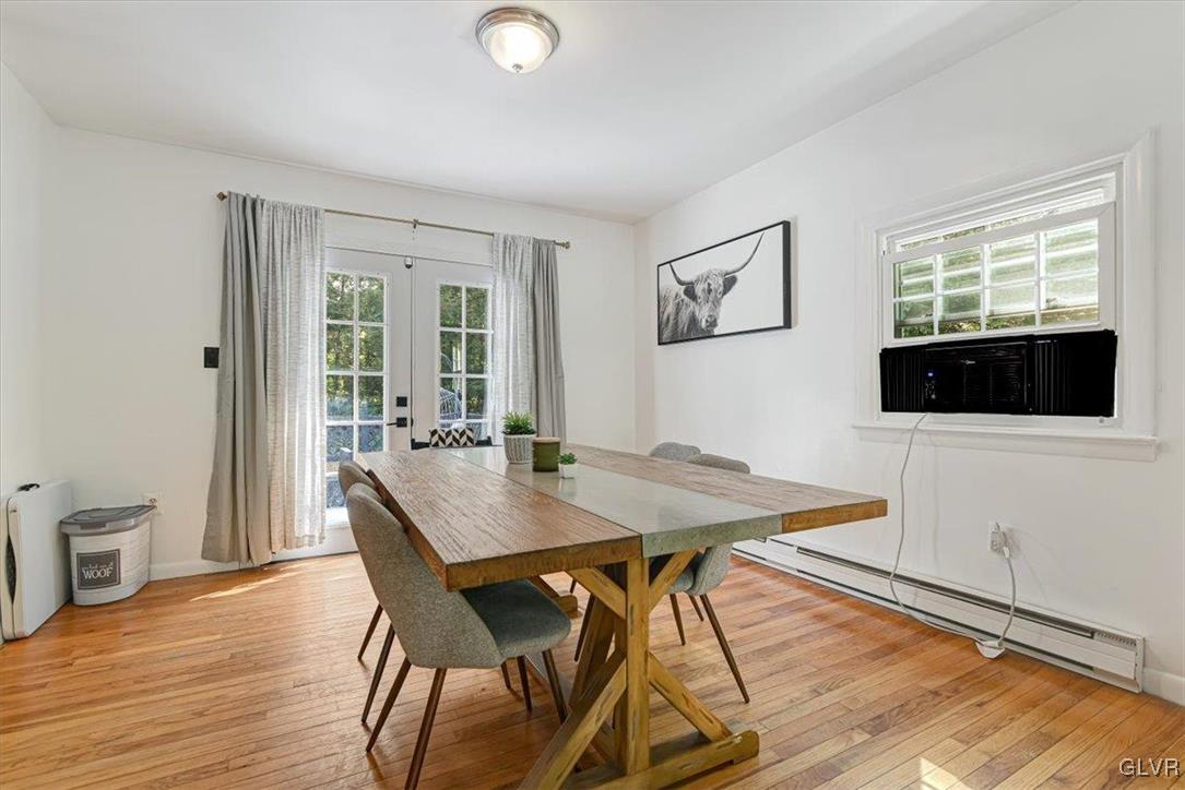 400 Carlton Road Mount Pocono, PA 18344 - Photo 8 of 50 a view of a dining room with furniture and wooden floor
