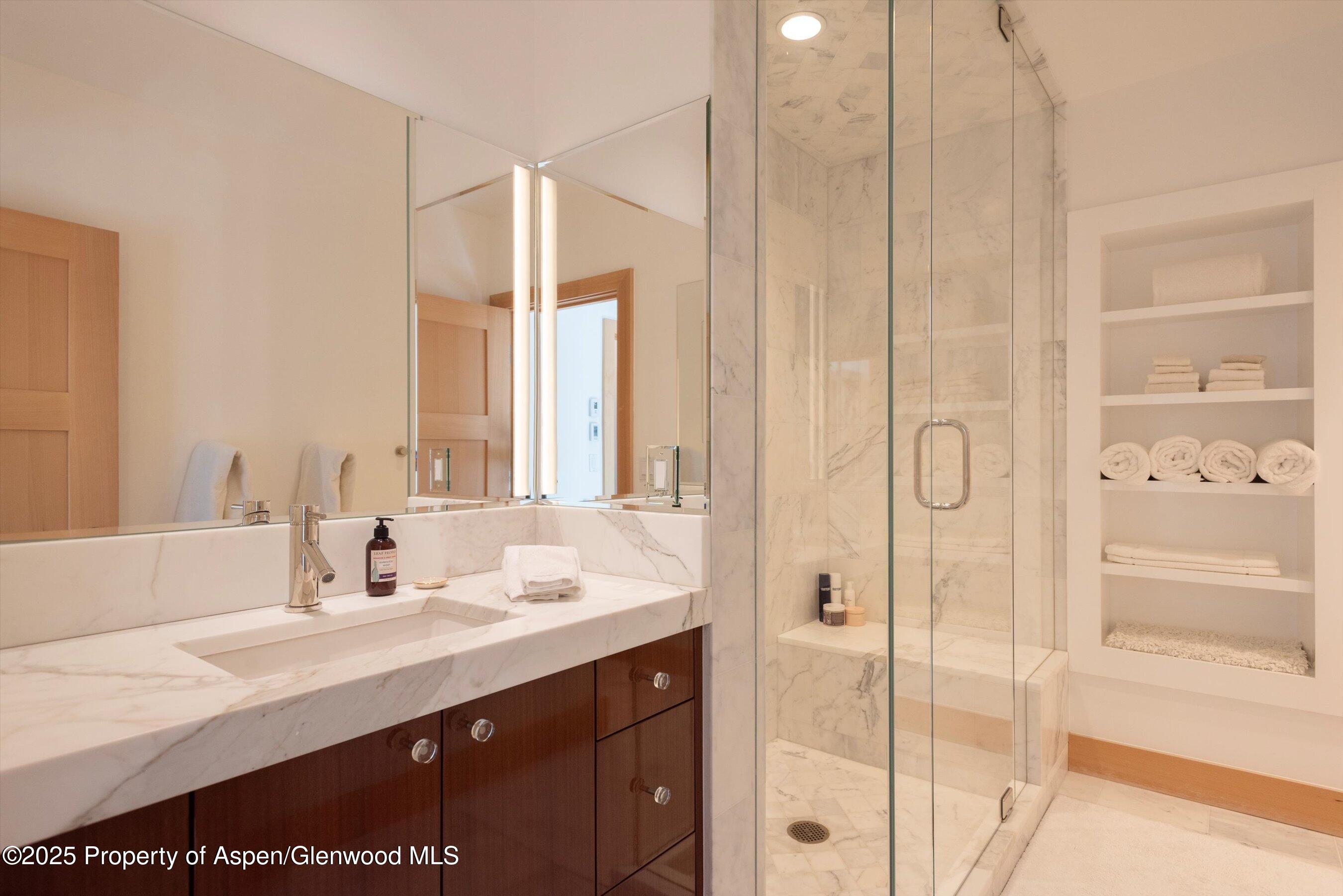 6770 Castle Creek Road Aspen, CO 81612 - Photo 33 of 53 a bathroom with a double vanity sink mirror and double