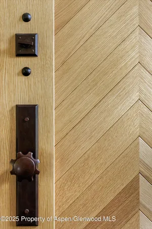 a view of a balcony with wooden floor and fence
