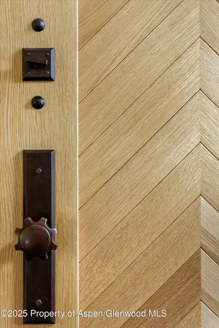 a view of a balcony with wooden floor and fence