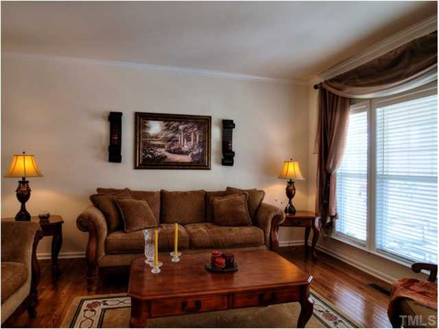 1912 Grace Point Road Morrisville, NC 27560 - Photo 2 of 25 Gorgeous Living room greets you as you enter the front door. Beautiful hardwood floors and smooth ceilings are a magnificent treat! Living Room