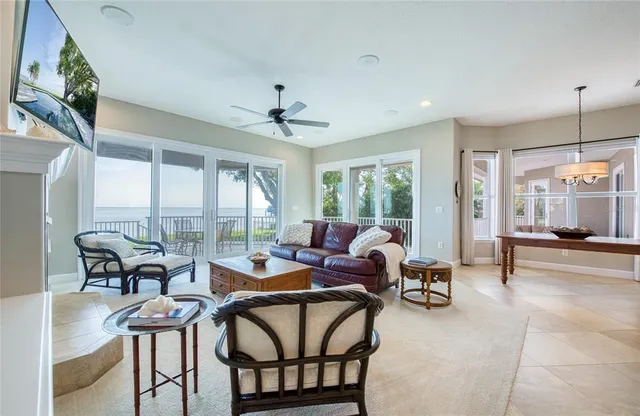 a spacious bathroom with a granite countertop double vanity sink and a bathtub