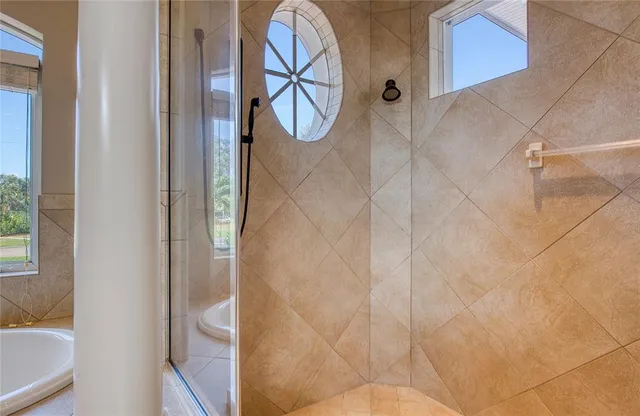 a view of a swimming pool with a yard