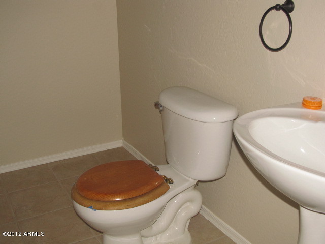 671 West Rattlesnake Place Casa Grande, AZ 85122 - Photo 9 of 22 half bath down stairs