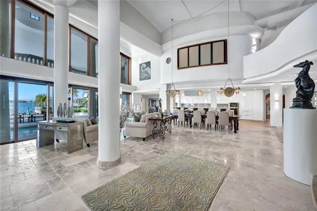 a view of a dining hall with many windows