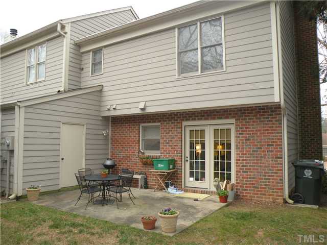 1346 Baez Street Raleigh, NC 27608 - Photo 12 of 12 a backyard of a house with outdoor seating