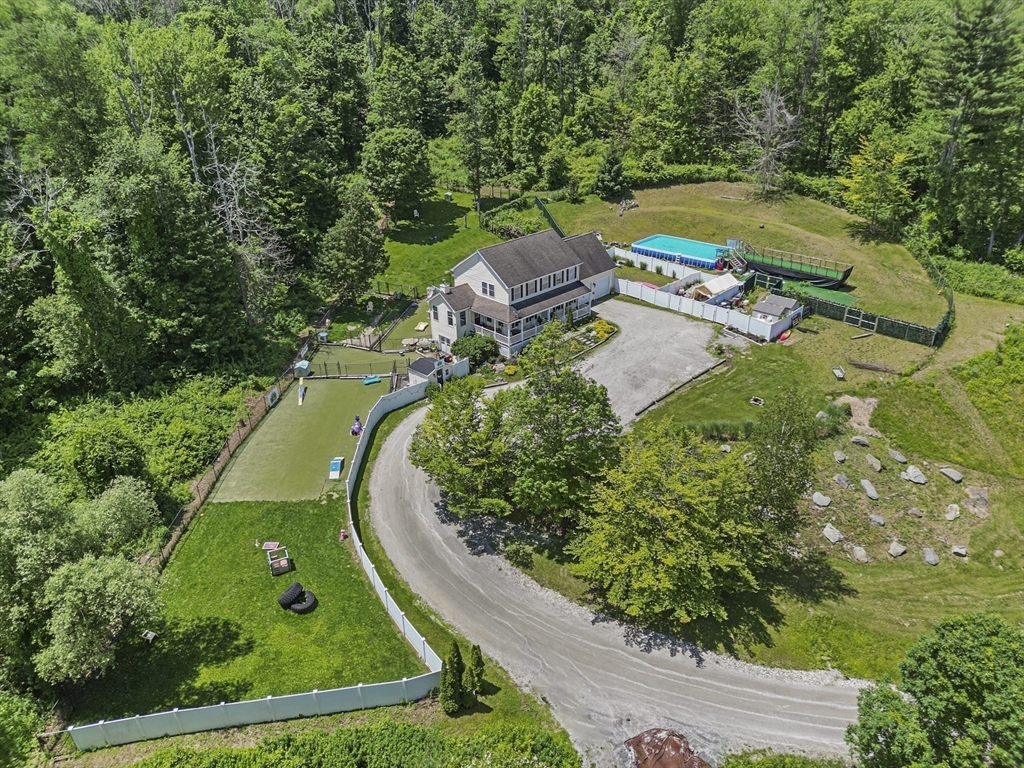 21 East Street Stockbridge, MA 01262 - Photo 2 of 11 an aerial view of a house with a garden