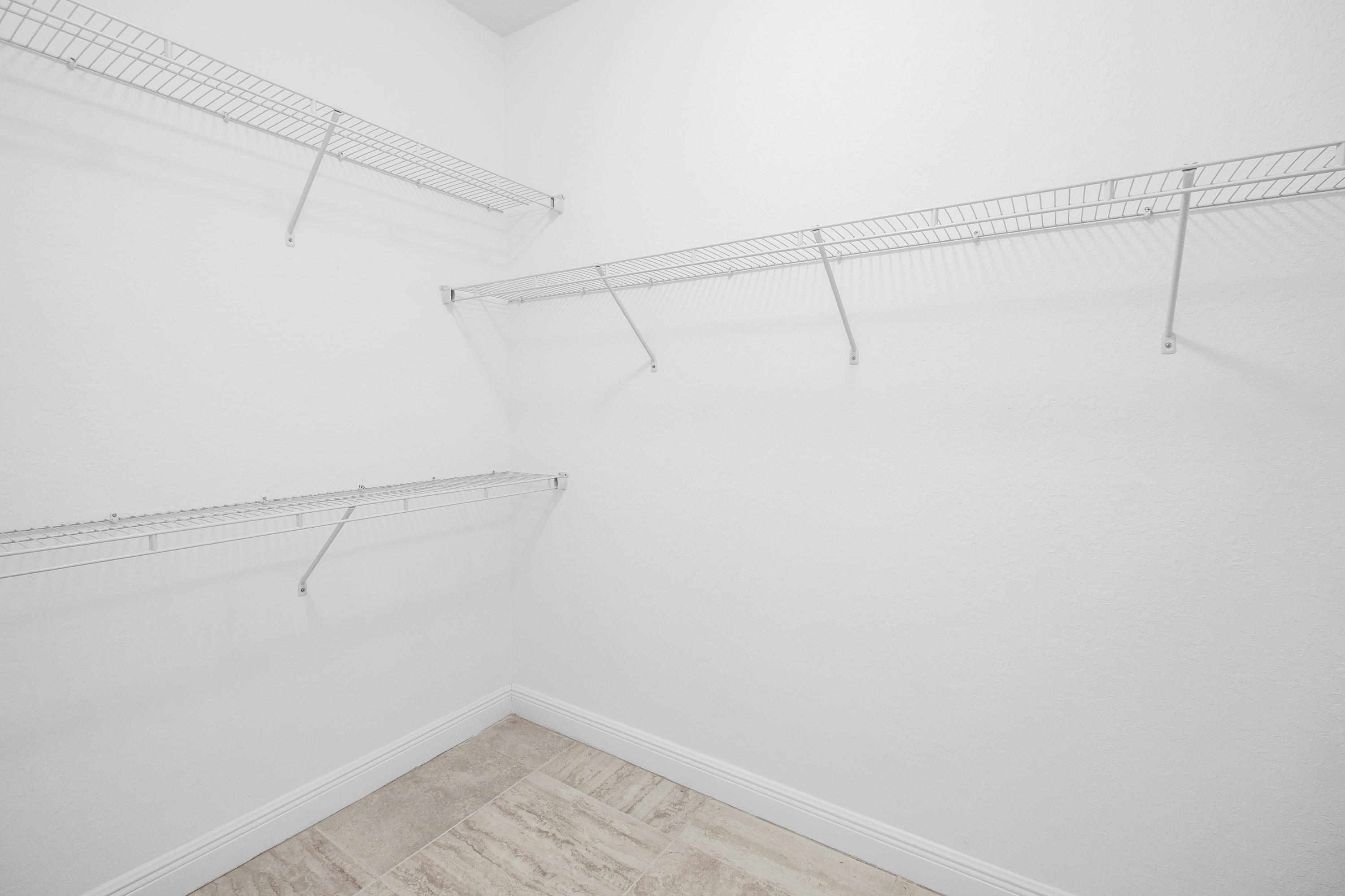 4823 Southwest Millbrook Lane Stuart, FL 34997 - Photo 12 of 20 Walk-in Closet