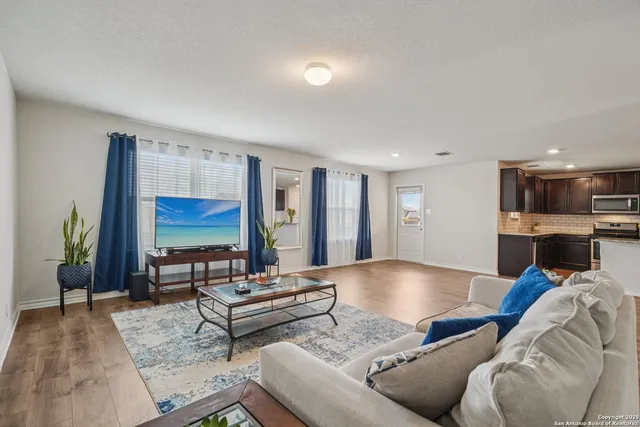 a kitchen with stainless steel appliances granite countertop cabinets and granite counter tops