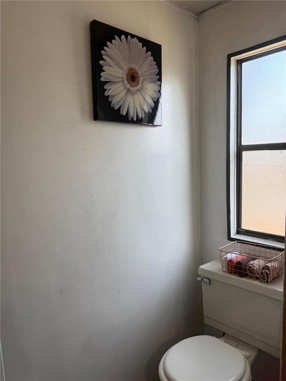 7112 Blacks Bluff Road Southwest Cave Spring, GA 30124 - Photo 11 of 22 a bathroom with a toilet and a vanity