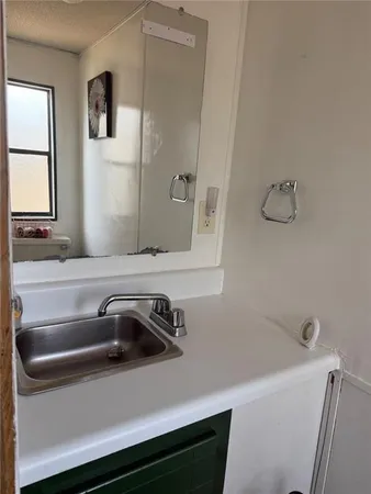 a bathroom with a sink and a bathtub