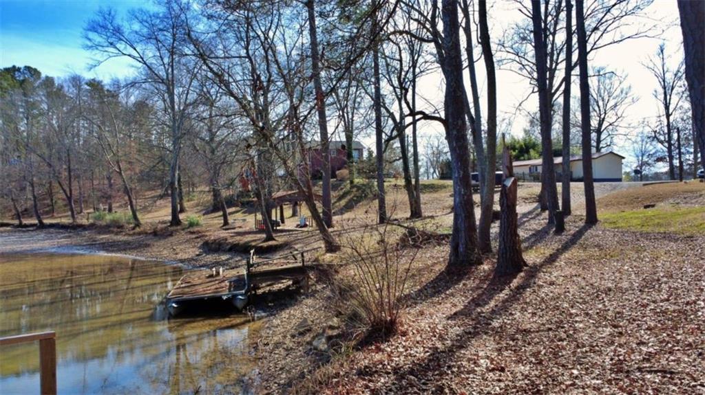7112 Blacks Bluff Road Southwest Cave Spring, GA 30124 - Photo 14 of 22 a view of yard with trees