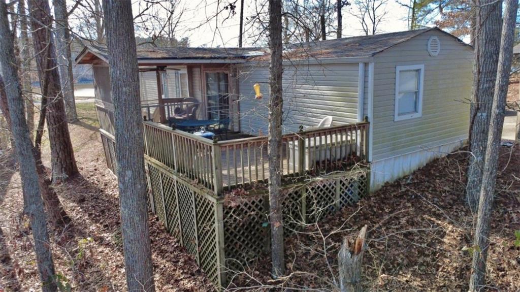7112 Blacks Bluff Road Southwest Cave Spring, GA 30124 - Photo 4 of 22 a view of a house with wooden fence