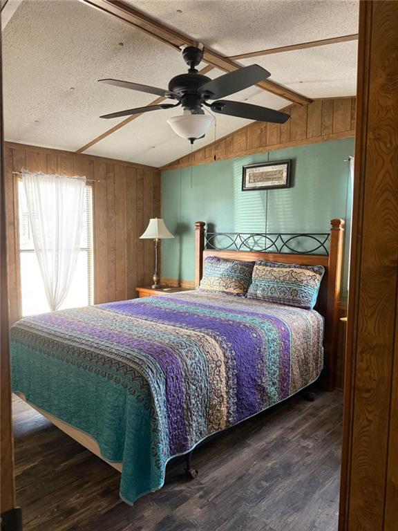 7112 Blacks Bluff Road Southwest Cave Spring, GA 30124 - Photo 5 of 22 a bedroom with a bed and a chandelier