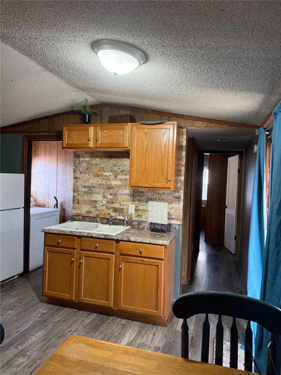 7112 Blacks Bluff Road Southwest Cave Spring, GA 30124 - Photo 7 of 22 a kitchen with a sink cabinets and wooden floor