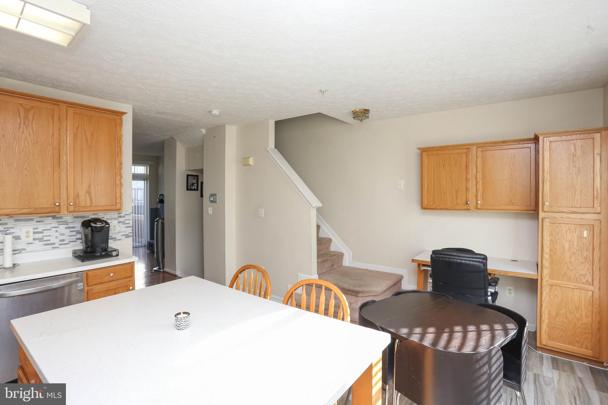 1734 Sea Pine Circle, Unit 136 Severn, MD 21144 - Photo 15 of 32 a bathroom with a tub sink and mirror