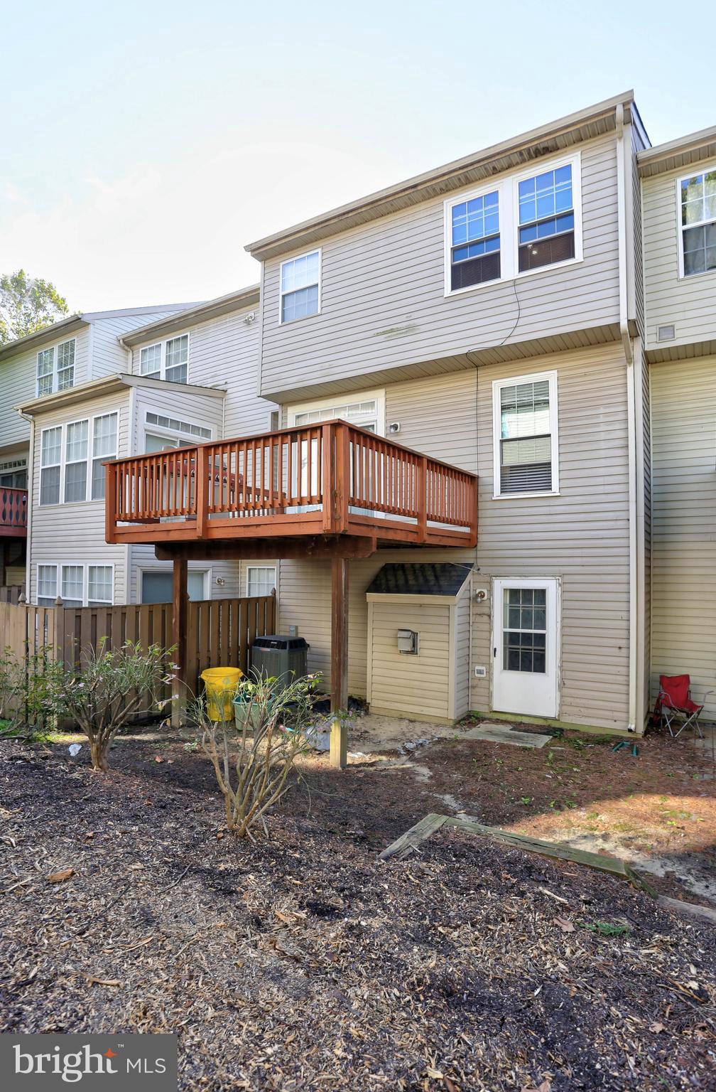 1734 Sea Pine Circle, Unit 136 Severn, MD 21144 - Photo 28 of 32 a view of a house with backyard and porch