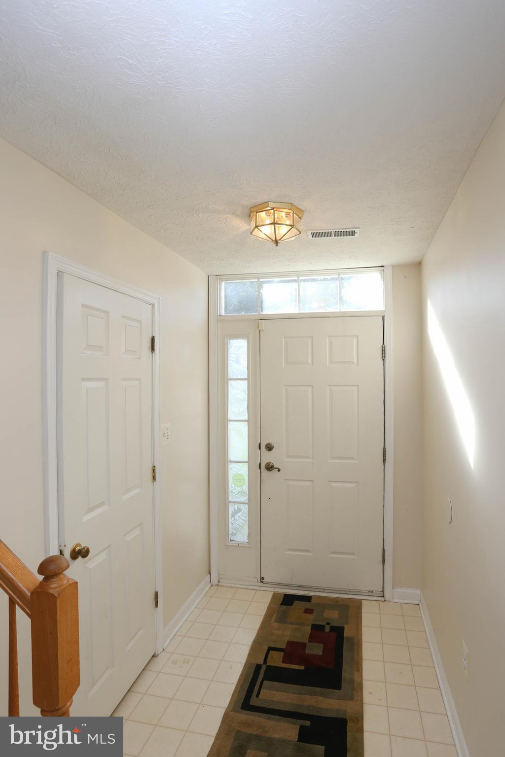 1734 Sea Pine Circle, Unit 136 Severn, MD 21144 - Photo 5 of 32 wooden floor in a gallery