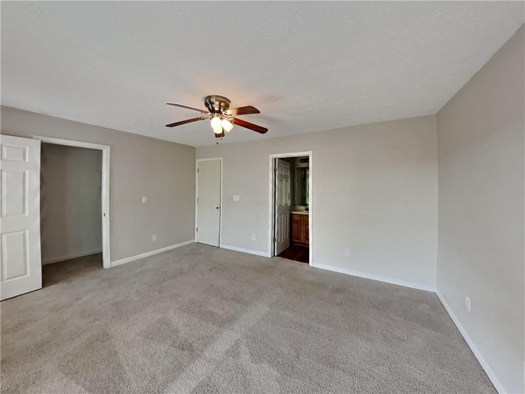 3527 Waldrop Trail Decatur, GA 30034 - Photo 11 of 20 a view of an empty room with a fan