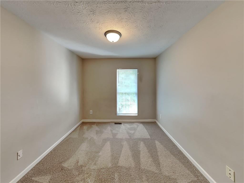 3527 Waldrop Trail Decatur, GA 30034 - Photo 12 of 20 a view of an empty room and window