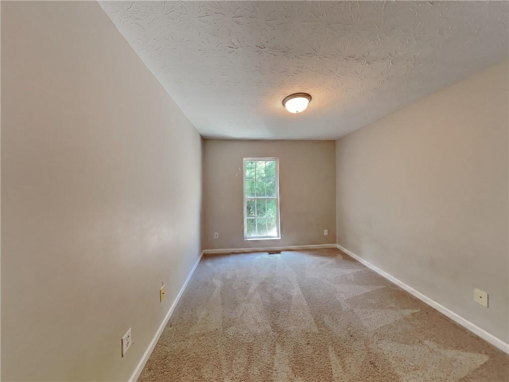 3527 Waldrop Trail Decatur, GA 30034 - Photo 15 of 20 a view of an empty room with a window