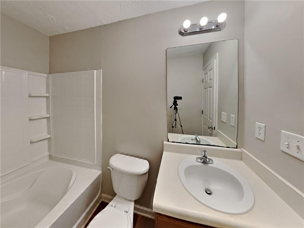 3527 Waldrop Trail Decatur, GA 30034 - Photo 18 of 20 a bathroom with a sink toilet and shower