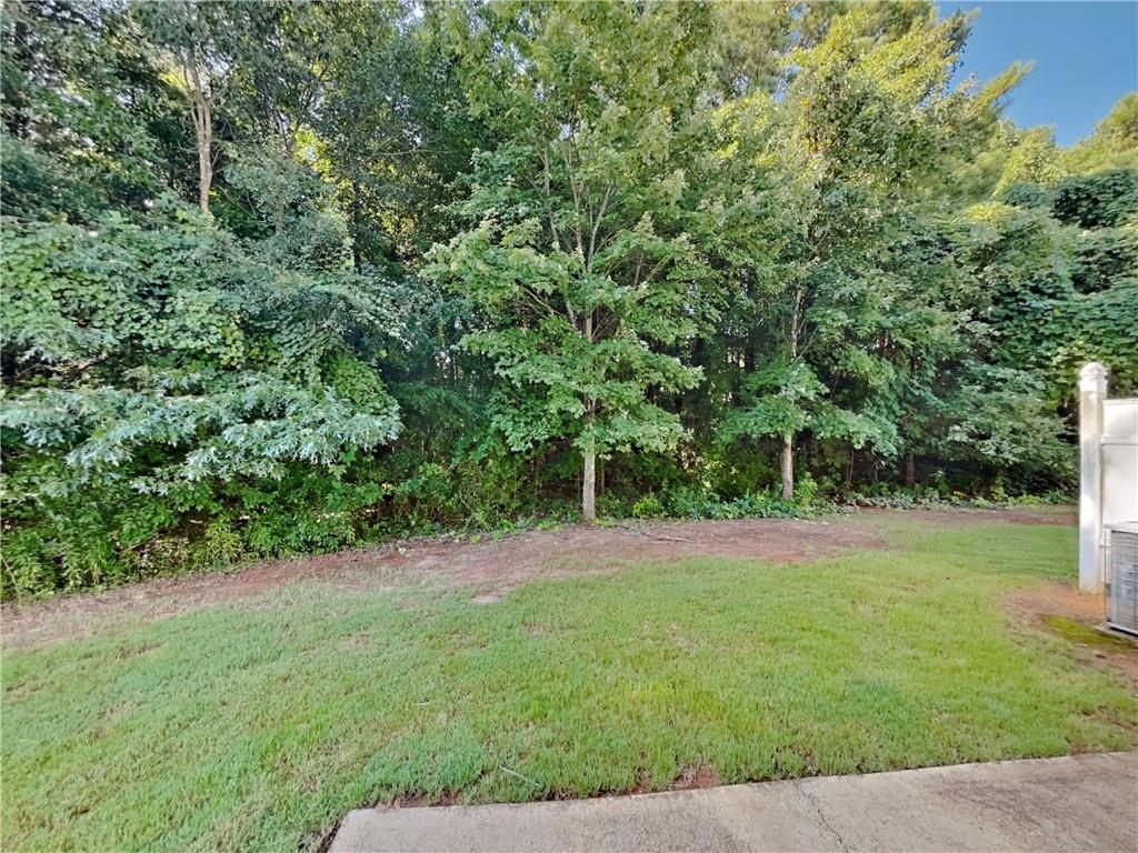 3527 Waldrop Trail Decatur, GA 30034 - Photo 20 of 20 a backyard of a house with lots of green space