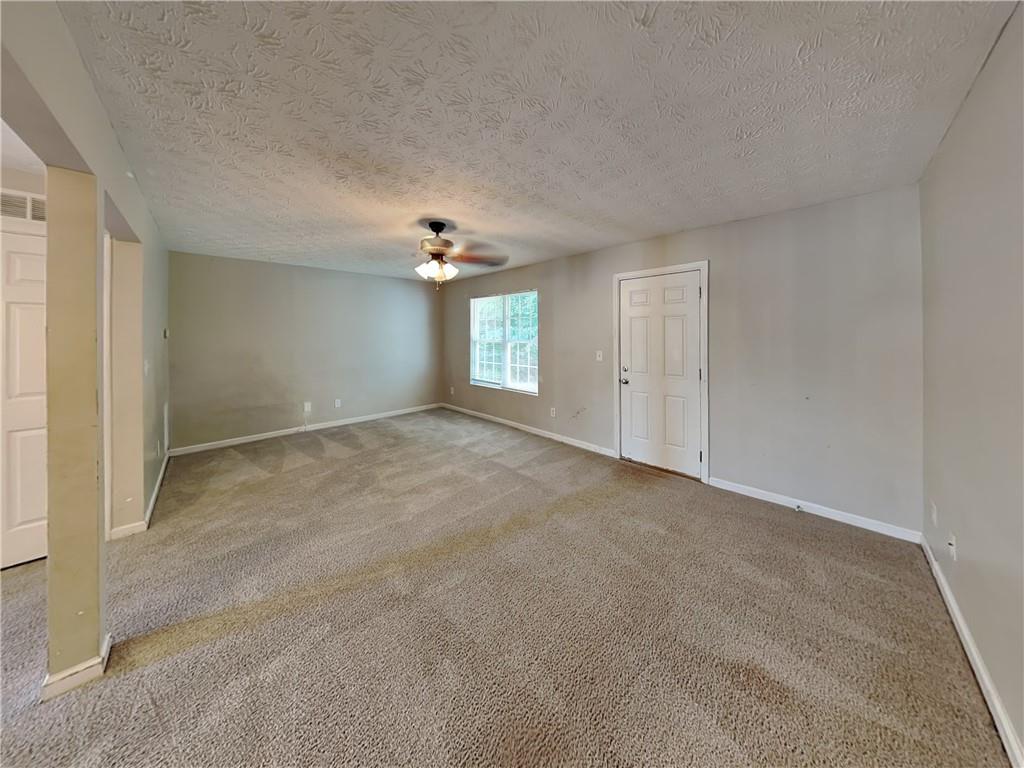 3527 Waldrop Trail Decatur, GA 30034 - Photo 2 of 20 a view of an empty room with a window
