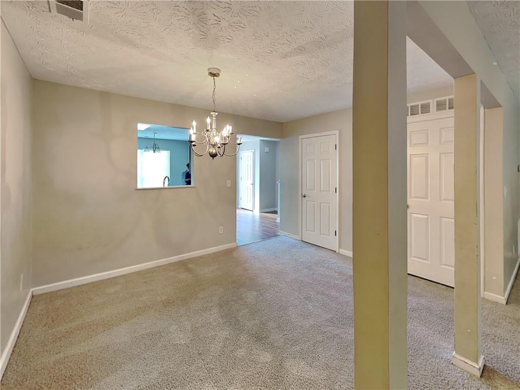 3527 Waldrop Trail Decatur, GA 30034 - Photo 5 of 20 a view of a chandelier in big room and chandelier