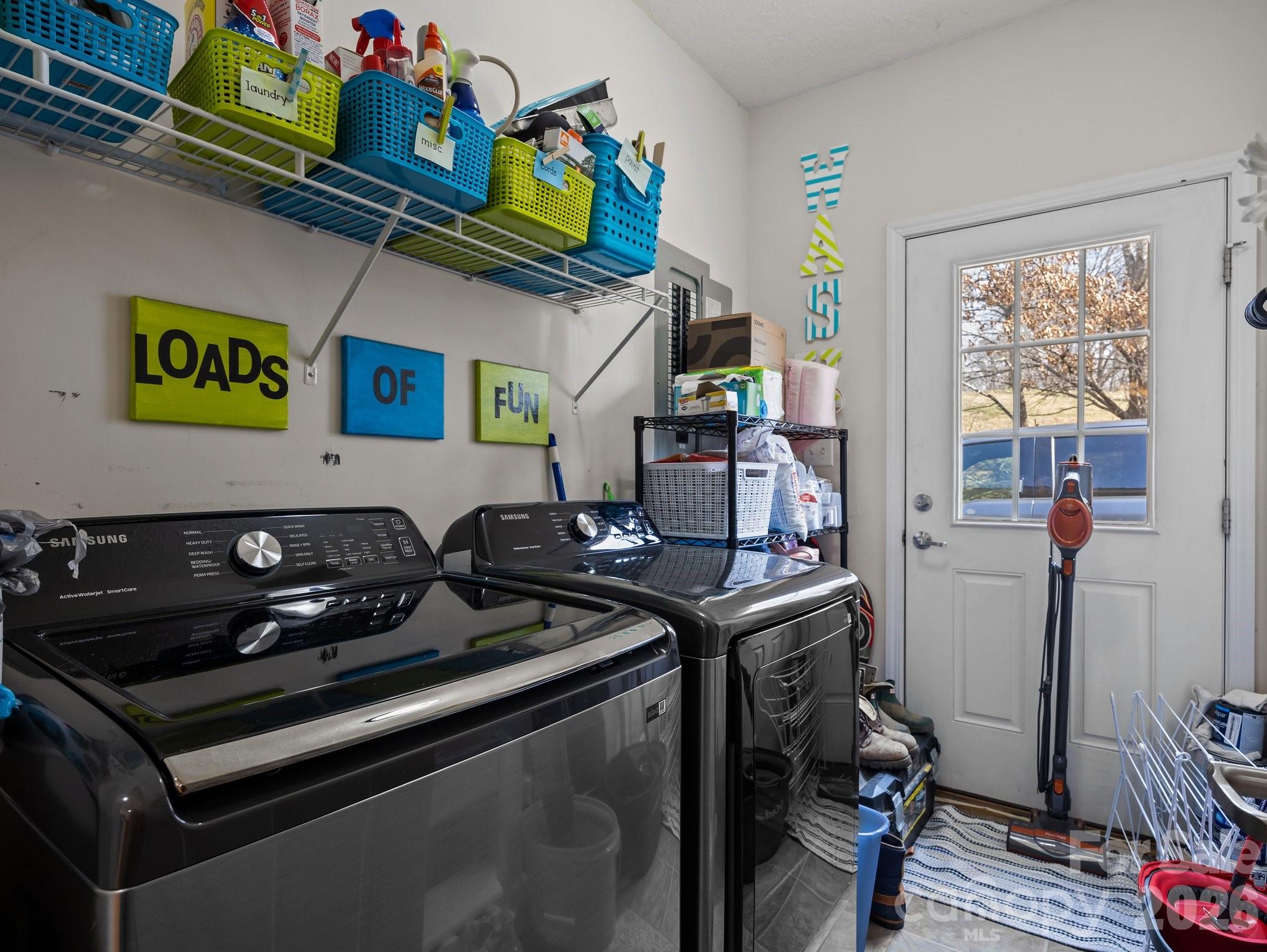 233 Thompson Cv Road Clyde, NC 28721 - Photo 22 of 24 a kitchen with stainless steel appliances granite countertop a stove and a sink