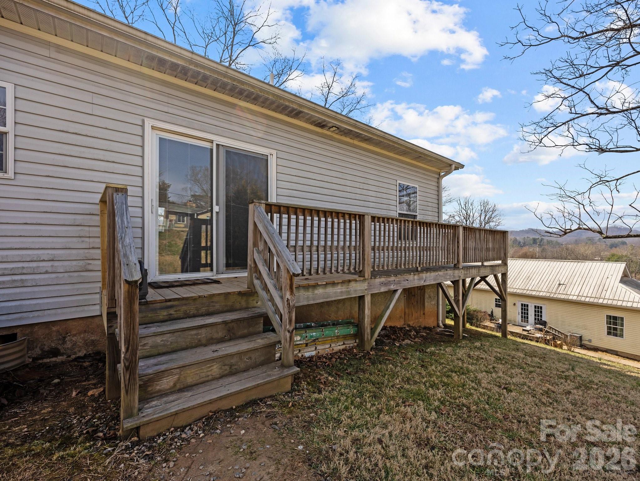 233 Thompson Cv Road Clyde, NC 28721 - Photo 23 of 24 a view of a chair and table in backyard
