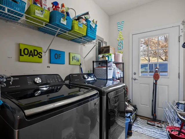 a kitchen with stainless steel appliances granite countertop a stove and a sink