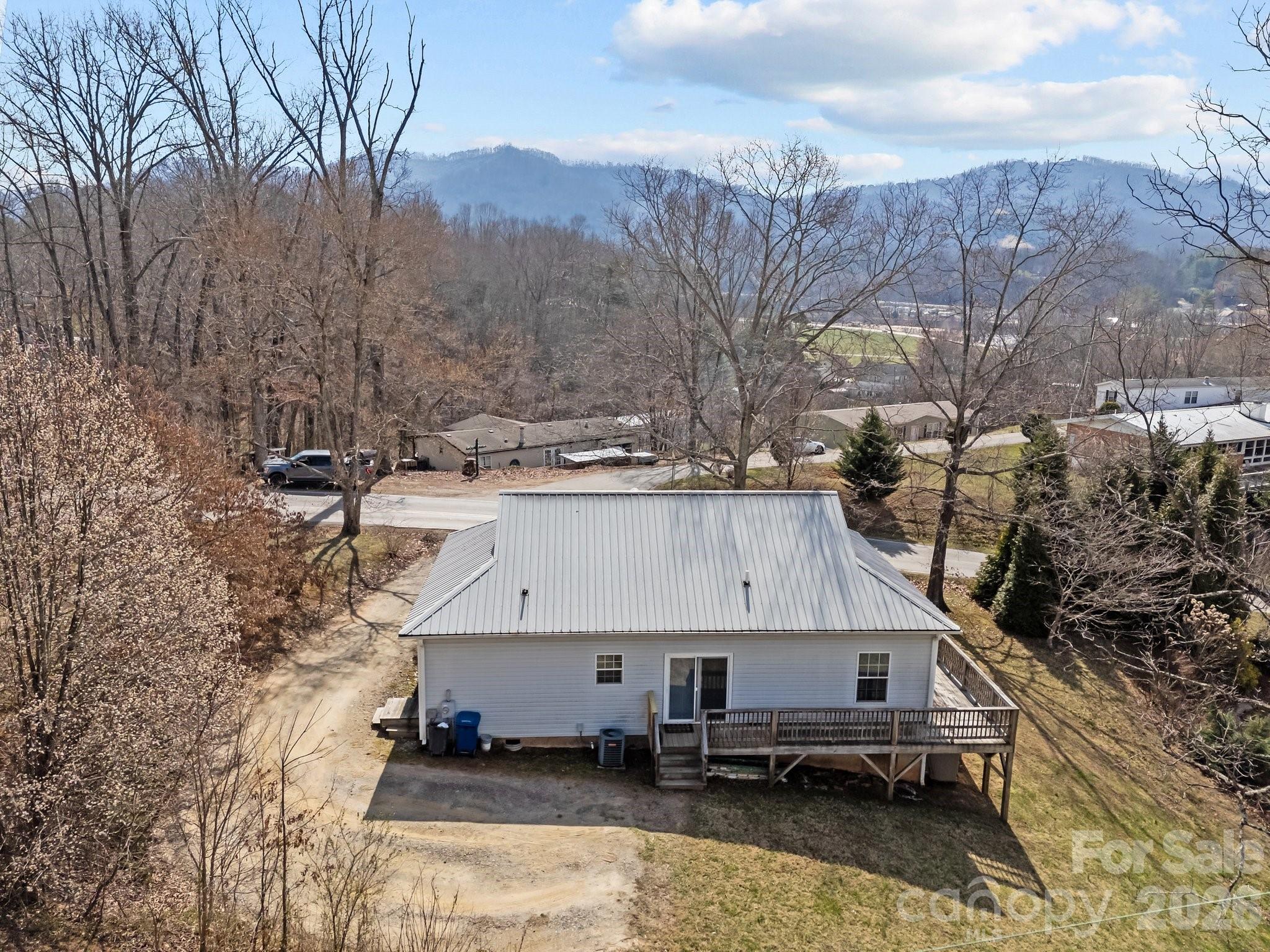 233 Thompson Cv Road Clyde, NC 28721 - Photo 3 of 24 a view of house with outdoor space